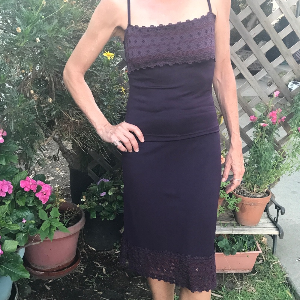 Beautiful curve hugging purple top and skirt set.